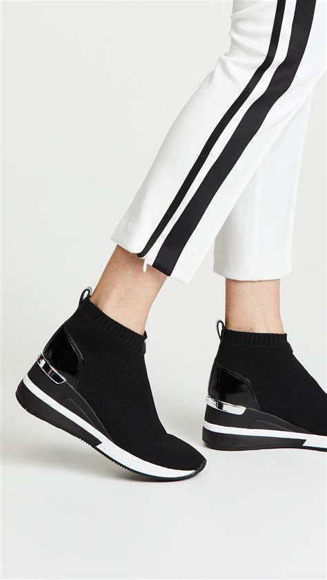 michael kors skyler bootie black|mk skyler wedge sneakers.